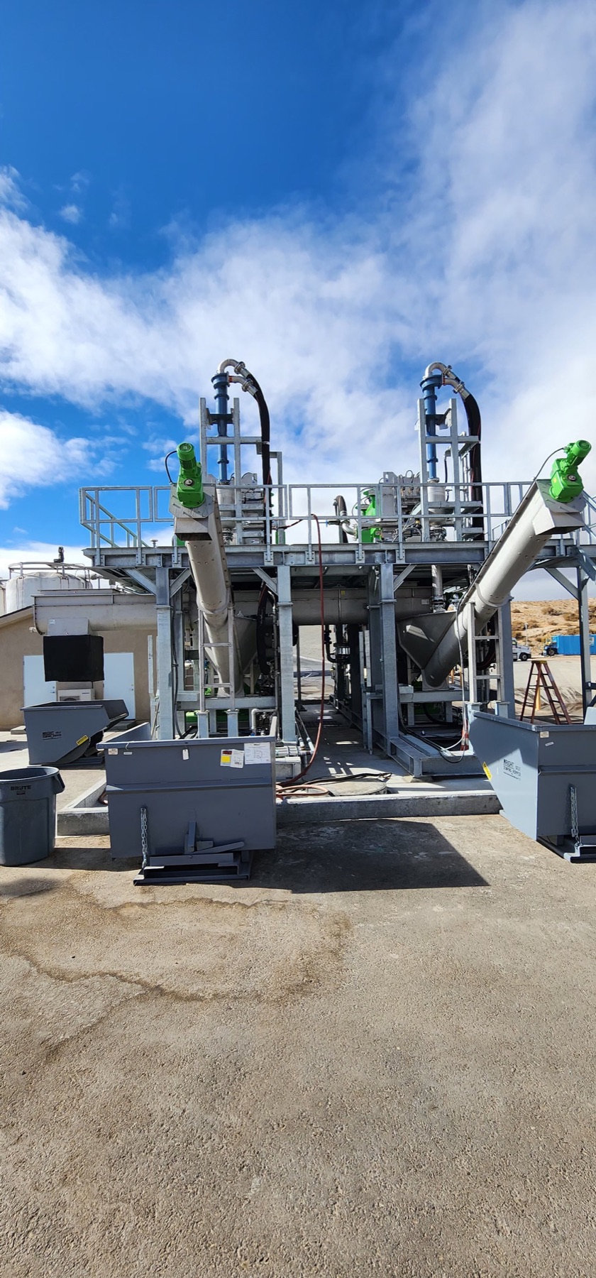 Twin screw conveyors and industrial process equipment